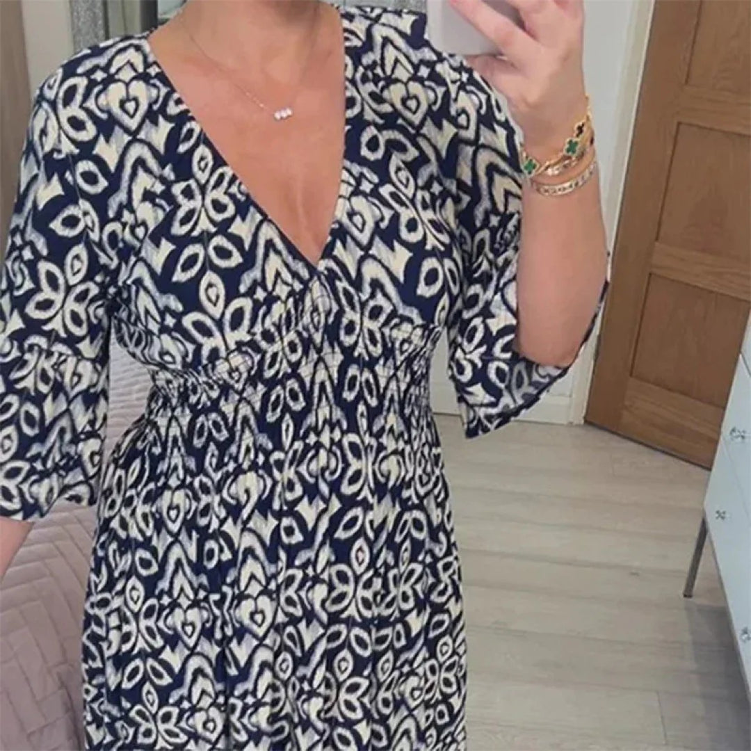 Dina – Flowy V-Neck Floral Dress